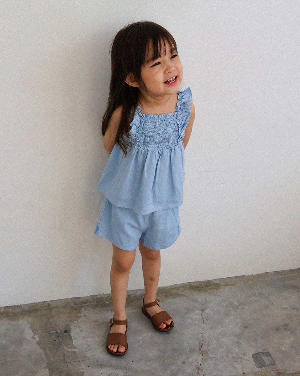 Smocked bodice ruffle-trim set in blue