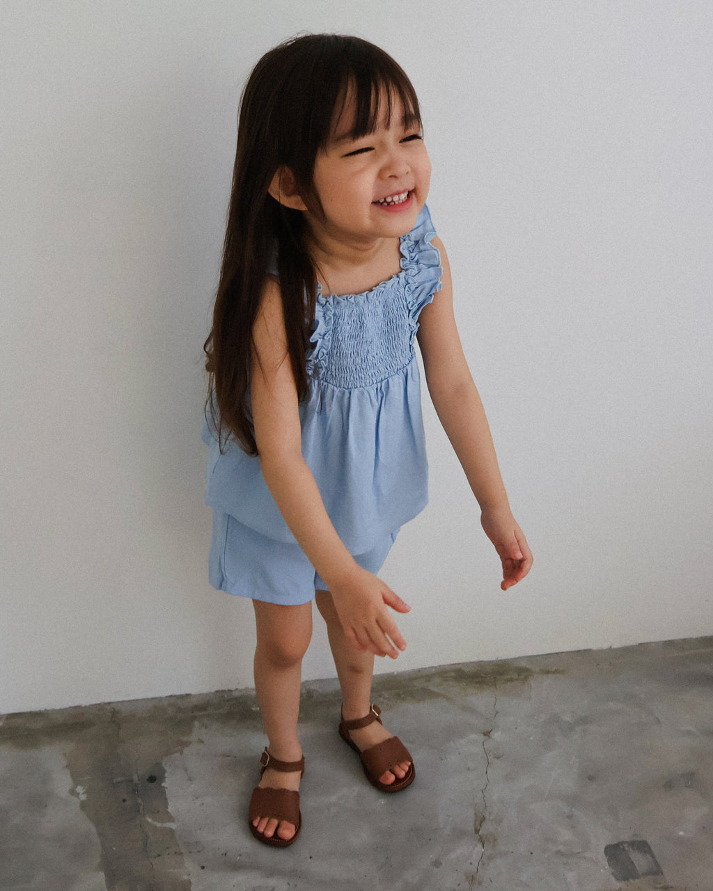 Smocked bodice ruffle-trim set in blue
