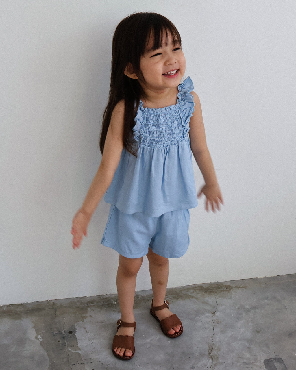 Smocked bodice ruffle-trim set in blue