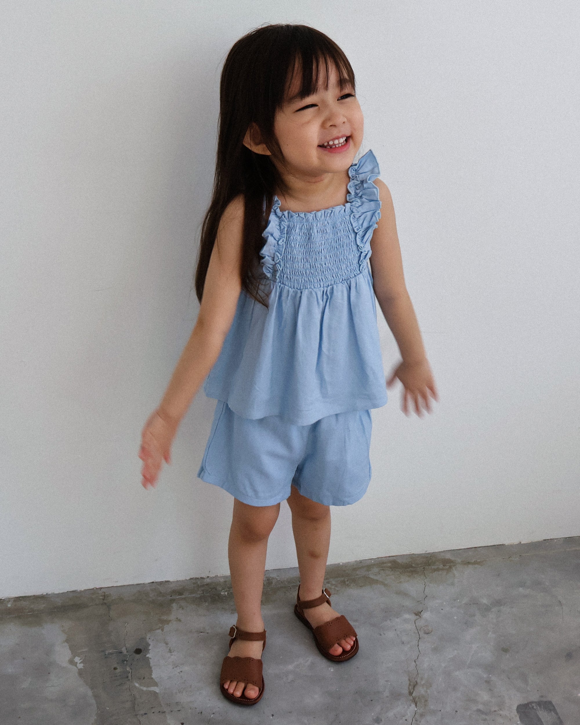 Smocked bodice ruffle-trim set in blue
