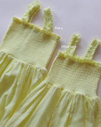 Lemon smocked dress